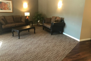 Family room - traditional family room idea in Other
