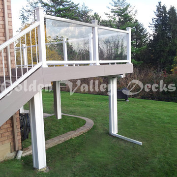 high level azek deck with glass railing