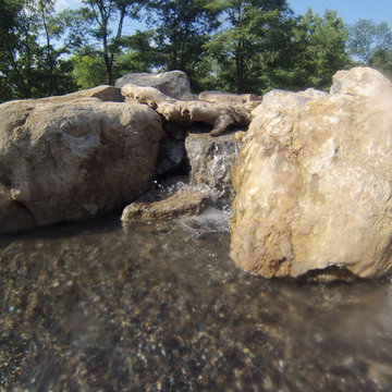 Natural Stone Waterfall in Swimming Pool