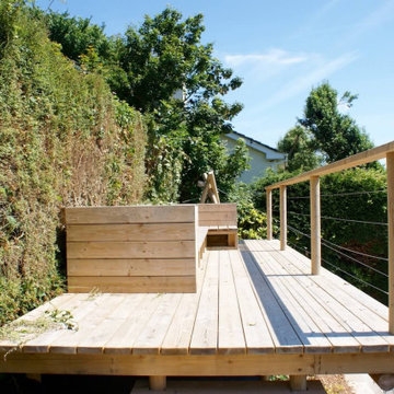 Wooden platform with outdoor sofa