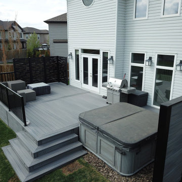 Custom Deck with Custom privacy screens, wrap around stairs and LED lighting