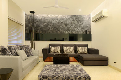 Trendy living room photo in Delhi
