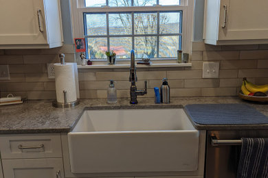 Inspiration for a mediterranean laundry room remodel in Other