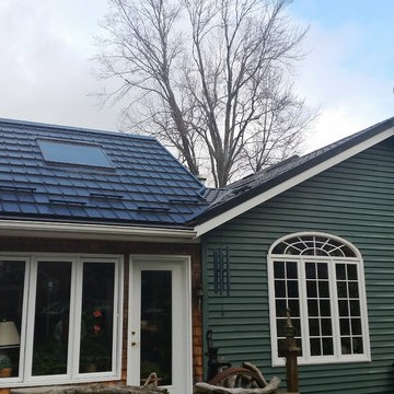 Houses with Hy-Grade's permanent steel roofing "cure"
