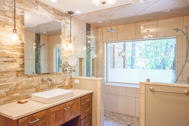 Inspiration for a large contemporary master green tile and stone tile porcelain tile and multicolored floor bathroom remodel in Other with recessed-panel cabinets, medium tone wood cabinets, beige walls, a vessel sink and quartz countertops