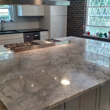 Super White Island with Black Absolute Honed Perimeter