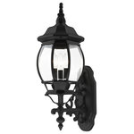 Livex Lighting - Textured Black Traditional, Colonial, French Historical, Outdoor Wall Lantern - The classically transitional outdoor Frontenac collection boasts a cast aluminum structure with dazzling ornamental design.  The upward facing three-light medium six-sided wall lantern comes in a textured black finish with clear beveled glass and extravagantly decorative scrolls. The ornate quality of this light will add radiance to your house exterior day or night.