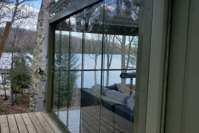 Sunroom - coastal sunroom idea in Toronto