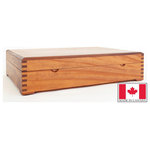 American Chest - #FCan2 Canadian SAPELE Flatware Chest; Solid SAPELE w/ Natural Finish - #FCan2 Canadian SAPELE Flatware Chest in Solid Exotic Sapele hardwood with Natural Finish hold Service for 12.  12-Knife Rack in the Lid; 10-Slot Flatware Rack to stack flatware in the deck; Two 6-Blade Spreader Blade Racks, 1 in each deck front corner.  Cover lift Arm to support the lid when open.  Made in CANADA for American Chest.