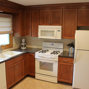 Small Kitchen Redesign with Maple Cabinets and Laminate Countertops