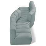 Meridian Furniture - Arc Vegan Leather Upholstered 4-Pc. Facing Modular Sectional, Green - Unleash modern opulence with the Arc Vegan Leather 4pc. Sectional. Crafted for the modern connoisseur, this Sectional injects an air of refined luxury into any space. Its sleek silhouette, upholstered in supple mint green vegan leather, exudes timeless sophistication while the deep channel tufting adds textural intrigue, further elevating the chair's visual appeal. The modular design makes it a versatile chameleon, effortlessly adapting to your evolving needs and preferences. Whether you envision it gracing a chic living room corner, basking in the glow of a bedroom window, or adding a touch of drama to a home office, the Arc seamlessly complements your unique interior aesthetic.