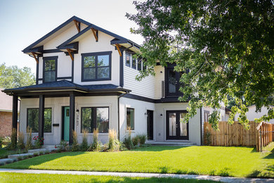 Large transitional two-storey white house exterior in Denver with concrete fiberboard siding, a gable roof and a shingle roof.