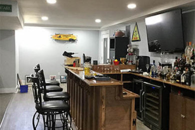 Basement - traditional basement idea in Boston