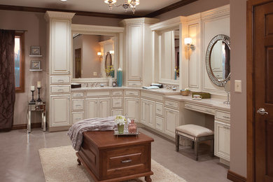 Transitional bathroom photo in Miami with raised-panel cabinets and white cabinets