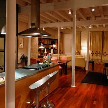 Loft. Espacio abierto con elementos arquitectónicos visibles