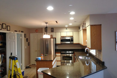 Example of a single-wall eat-in kitchen design in Baltimore