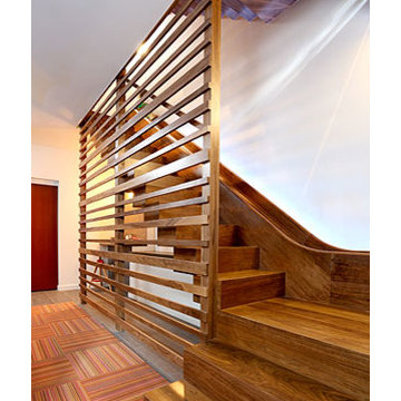 Custom walnut stairs and slide hybrid
