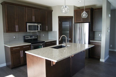Kitchen - transitional kitchen idea in Calgary