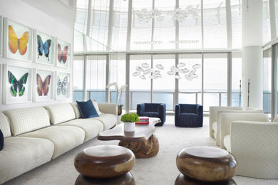 Inspiration for a large contemporary formal and open concept living room remodel in Miami with white walls