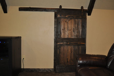 Entryway - rustic entryway idea in Houston