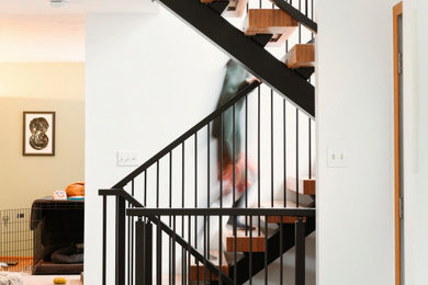 Staircase - contemporary spiral metal railing staircase idea in Other