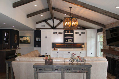 Example of a mid-sized arts and crafts home design design in Orange County