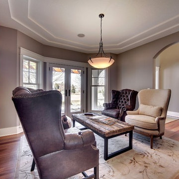 Weathered Antique Paneling Accent Wall in a Traditional Sitting Room