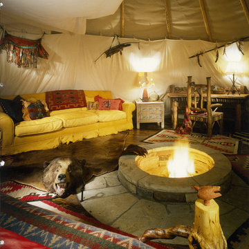 The Tepee's living room, office, and king size bed are shown here