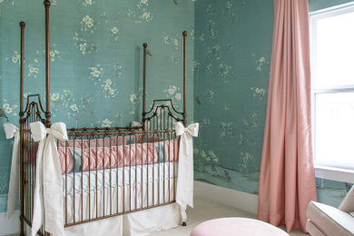 Example of a large classic girl carpeted, beige floor and wallpaper nursery design in Other with green walls