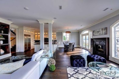 Minimalist family room photo in Vancouver