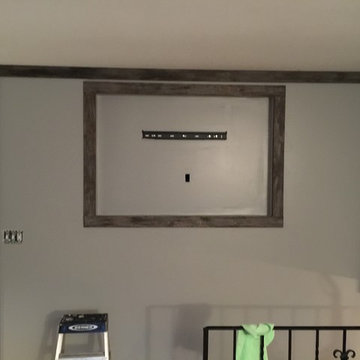 Pallet accent wall on a side split foyer