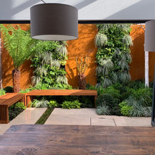 time sunny garden with bifold doors to the back, water drain installati