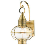 Livex Lighting - Antique Brass Nautical, Farmhouse, Bohemian, Colonial, Outdoor Wall Lantern - The Newburyport outdoor large single-light wall lantern boasts classic nautical and railway styling. This piece features a beautiful hand-blown clear glass globe and an antique brass finish over the hand crafted solid brass construction. With its easy installation and low upkeep requirements, this light will not disappoint.