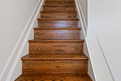 Staircase - contemporary wooden l-shaped staircase idea in DC Metro with wooden risers