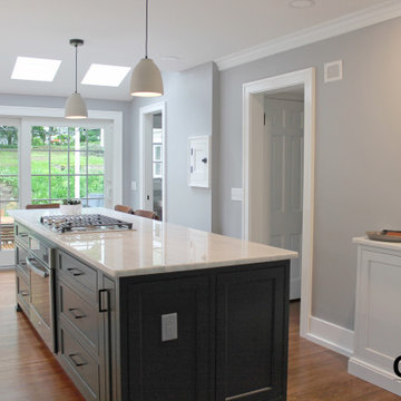 White Painted Kitchen with Gray Island