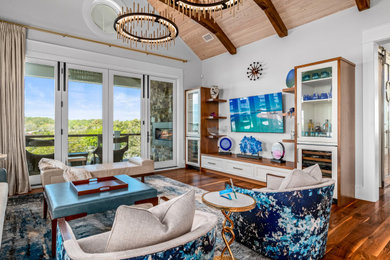 Example of a beach style living room design in Other