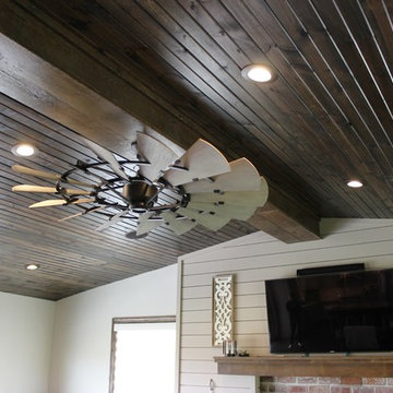 Farmhouse kitchen Taupe Painted Cabinets,Quartz Tops, and Dark Island