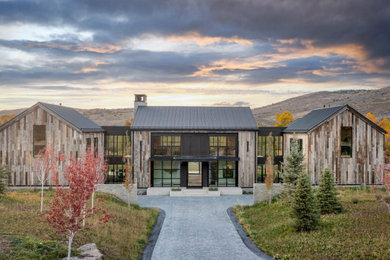 Farmhouse home design photo in Salt Lake City