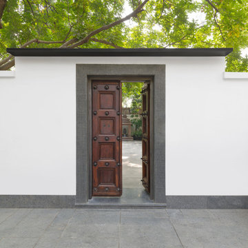 The Entrance, with old Chettinad doors that open into the Courtyard