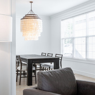 Open Concept Living – Modern Dining Area and Statement Chandelier