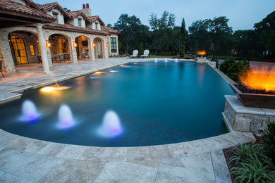 Inspiration for a mediterranean pool remodel in Dallas