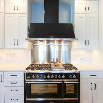 White and Gray Kitchen with Massive Storage Solutions