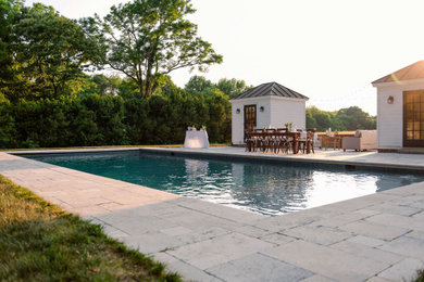 Inspiration for a large timeless backyard stone and rectangular pool remodel in Richmond