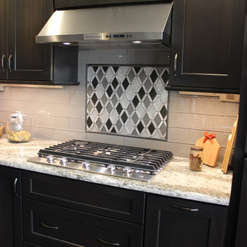 DuraSupreme Peppercorn Kitchen With Cambria Tops and Black Stainless Appliances