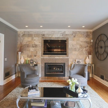 Stone Tile Wall Living Room with Embedded TV and Fireplace