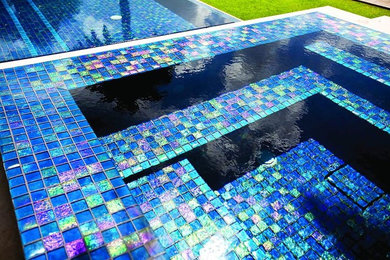 Island style pool photo in San Francisco