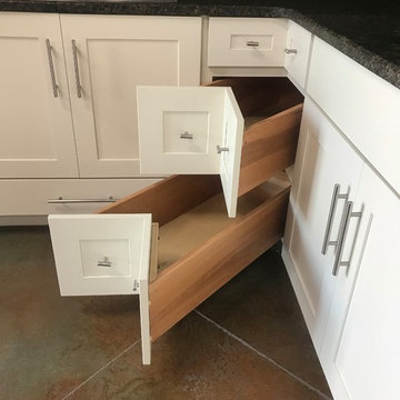 OFF WHITE KITCHEN WITH STACKED GLASS DOORS