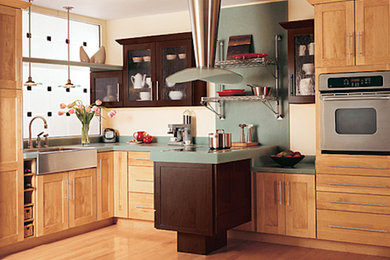 Light wood floor kitchen photo in Grand Rapids with light wood cabinets