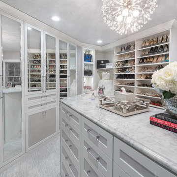 Dazzling Transitional His and Hers Master Closets