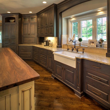 Rustic Alder cabinetry with painted and glazed island.